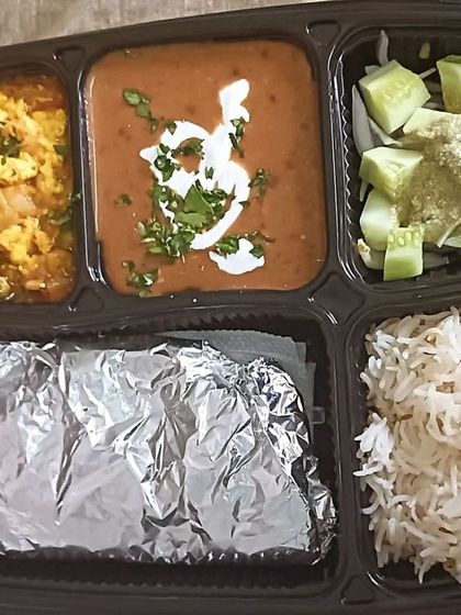 A classic combination of dal makhni and paneer bhurji. The creamy dal and the spiced scrambled cottage cheese are a match made in heaven.