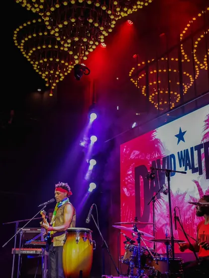 The stage is alive with the soulful Afro-Caribbean rhythms of French artist David Walters during our Fête de la Musique celebration. This shot captures the electrifying atmosphere of our live music concerts, where international artists connect with a packed Delhi audience.