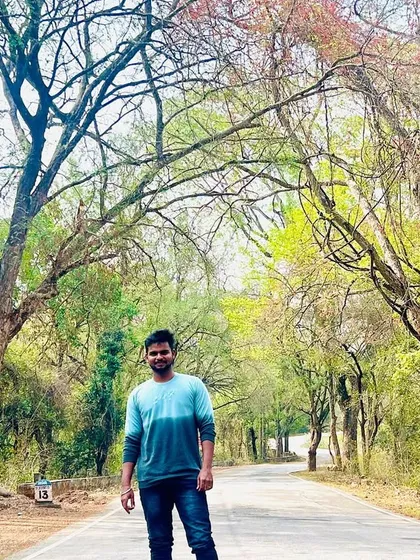 The beautiful canopy of trees makes the journey to Hogenakkal memorable.