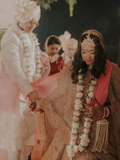 A close up of the couple during the wedding vows. This intimate shot focuses on their connection and the importance of the promises they are making to each other.