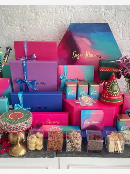 Here is a glimpse of my entire festive collection, ready to bring joy to your celebrations. I offer a wide range of customizable hampers, boxes, and trays to fit any occasion and budget. You can choose from my pre-curated selections or we can work together to build your own perfect gift.