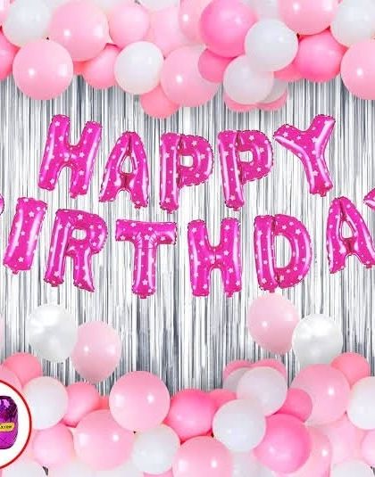 A simple DIY-style birthday decoration kit featuring pink "Happy Birthday" foil letters, a silver foil curtain, and pink and white balloons.