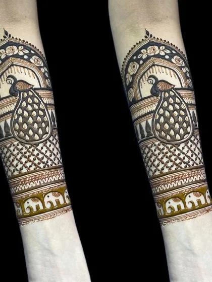 Here is another variation of the peacock and elephant motif design. I encourage my students to develop their own style once they have mastered the basic forms.