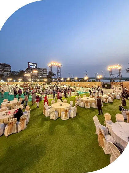 This is the scale we operate on. A sprawling outdoor setup for a grand celebration, where we ensured every one of the thousands of guests experienced impeccable service and delicious food. We transform any open space into a magnificent banquet.