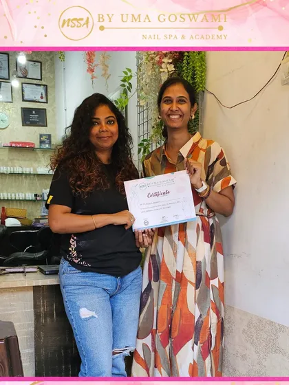 Minal proudly holding her course completion certificate. She is now equipped with the knowledge and confidence to excel.