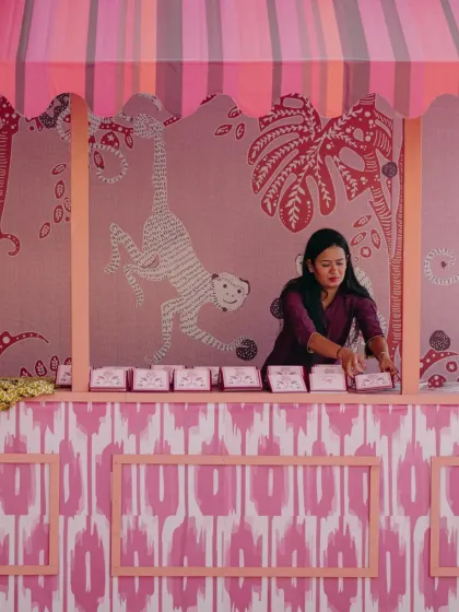 A bangle bar with custom-printed backdrops, where guests could pick their own wedding favors.