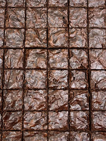 Look at that crinkle top. Our most-loved brownies are incredibly gooey and chocolatey, and you'd never guess they are completely eggless and made without any refined sugar.