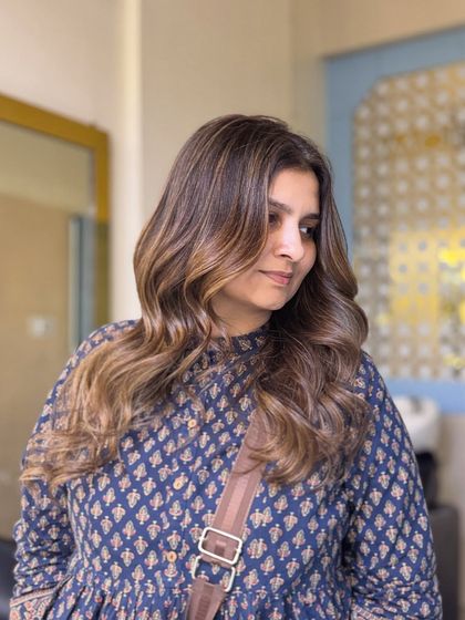 Rocking blonde hair is all about confidence. This stunning balayage is perfect for making a statement, with beautiful highlights that catch the light with every move.