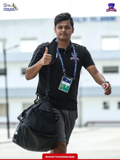 A player arriving with a thumbs-up, ready for the game.