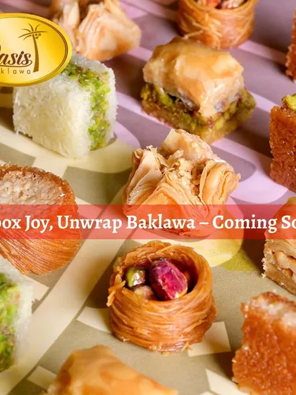 Unbox Joy, Unwrap Baklava. A teaser image announcing the upcoming launch of our South Extension store, featuring a colorful assortment of our sweets.