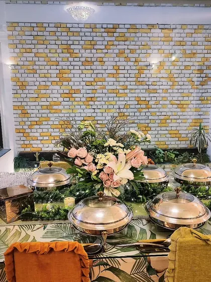No space is too small for an elegant setup. We specialize in transforming even compact living rooms into classy dining spaces with beautiful floral arrangements and premium chafing dishes for an intimate house party.