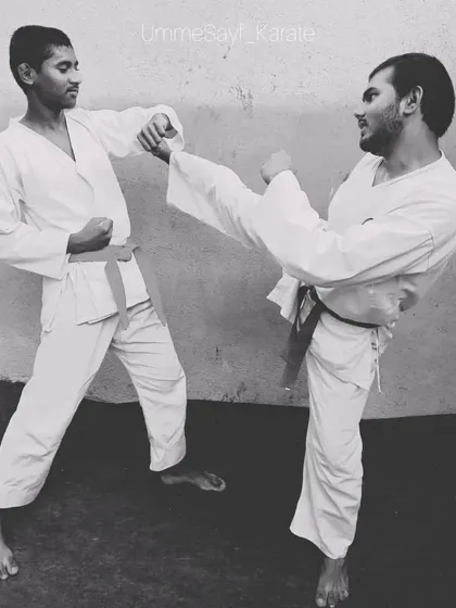 Practice makes you perfect. Two of my senior students sparring, demonstrating a block and a kick with great control. This is what consistent training looks like.