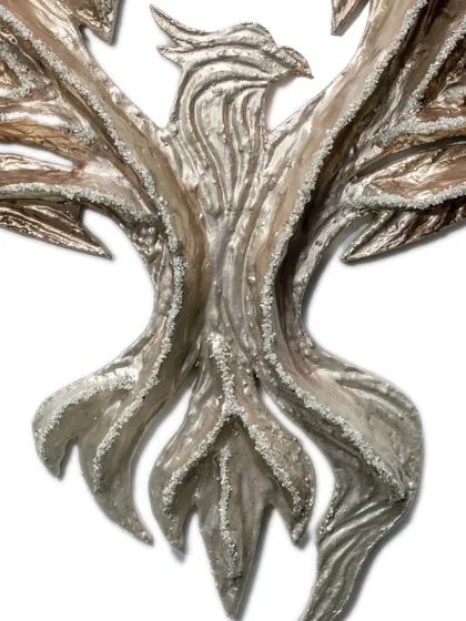 A close-up of the body of "The Eternal Flight," showing the texture and shimmer of the rough diamonds embedded in the upcycled paper.