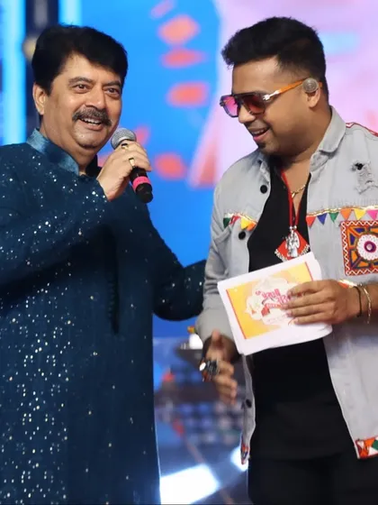 A memorable interaction on stage with a fellow artist during Prerna Raas Navratri. Collaboration and mutual respect are key to a great show.