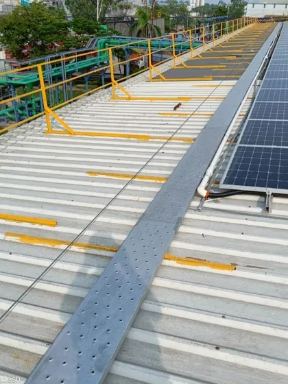 This photo highlights the safety railings and walkways installed alongside the solar panels. Adhering to strict HSE norms is a non-negotiable part of our process, protecting both the asset and the personnel who maintain it.