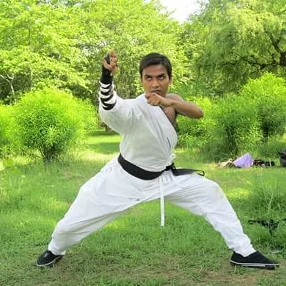 A strong stance is the root of all martial arts techniques. Here, I demonstrate the focus and readiness that I instill in all my students.