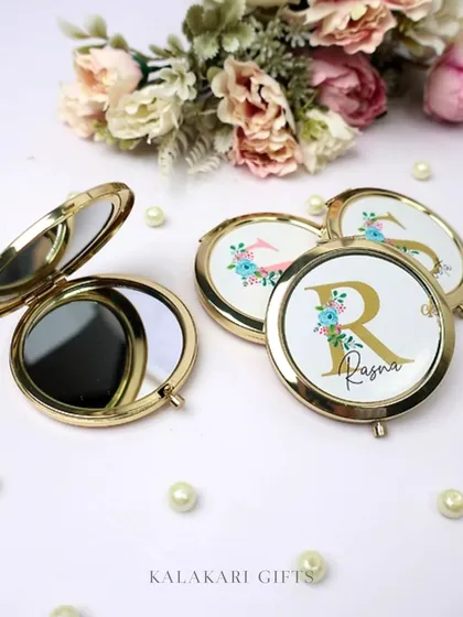 Another look at our custom floral pocket mirrors, a beautiful and practical accessory for touch-ups on the go.