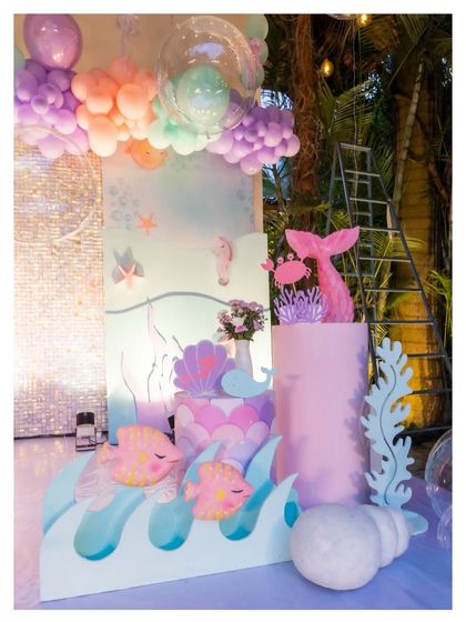 Another angle of the mermaid tail and fish props, showing the layers and details that make our underwater scenes so special.