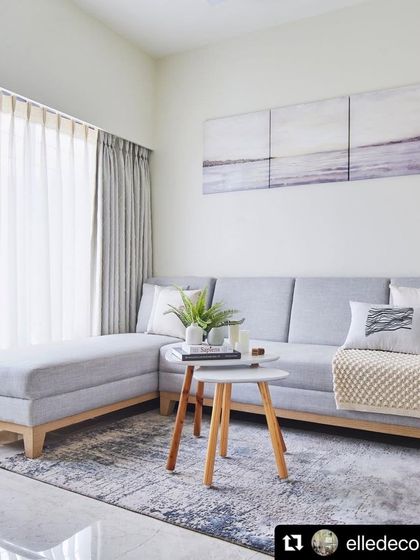 The living room as featured in Elle Decor India. The open layout meets plenty of daylight, while the elegant interiors create a comfortable sense of luxury.