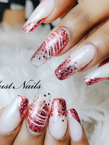 A festive and glamorous design with a milky white base, red glitter accents, and white line details.