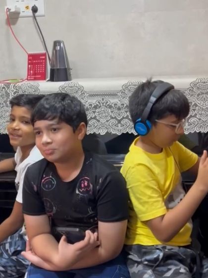 A few of our students waiting for their class to start. The friendships formed here are just as important as the music they learn.