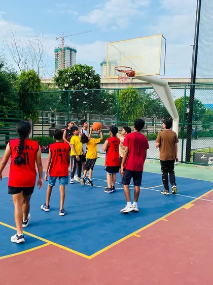 A player practices a layup, focusing on the correct footwork.