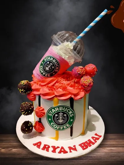For the coffee aficionado, this Starbucks-themed cake is a real treat. It features a gravity-defying edible coffee cup pouring onto the cake, complete with the iconic green logo and cake pops.