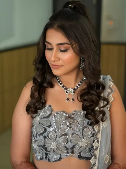 A close-up of the sangeet glam, with eyes closed to show the beautiful blending of the eyeshadow. The look is soft, shimmery, and perfect for an evening event.