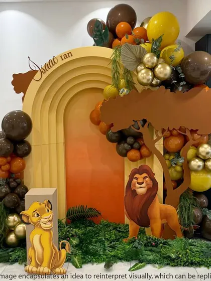 A modern and artistic take on the Lion King theme, using a layered, arched backdrop to create depth. The warm, earthy tones of the balloons and the Simba and Mufasa cutouts make this a sophisticated choice for a first birthday.