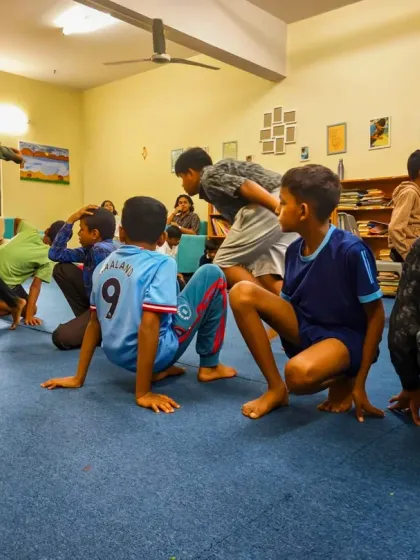 Laughter and energy fill the room as children act out a story. Our sessions are interactive, encouraging kids to move, play, and express themselves, which is a vital part of the healing process.
