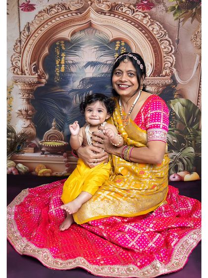 A beautiful portrait of Yashoda Maiya with her Kanha, capturing a moment of pure love and affection during the Janmashtami themed shoot.