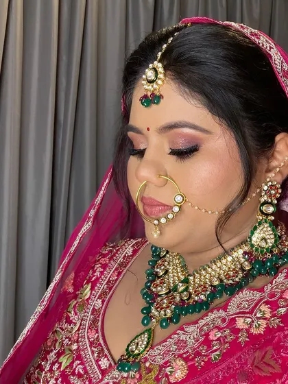 My beautiful bride Avani in a stunning pink lehenga. Her makeup was designed to be fresh and glowing, perfect for her destination wedding.
