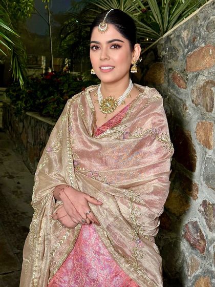 A beautiful and minimalist makeup look for this naturally beautiful girl. She is ready for her brother's Nikah in a lovely pink sharara set, with makeup that is fresh and glowing.