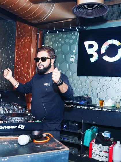 Life is a mix, and I make it a good one. A classic DJ pose at the console at BOHO Koramangala.