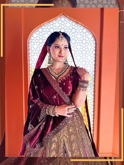 A close-up portrait of the bride, highlighting the beautiful neckline of the blouse and the matching dupatta.