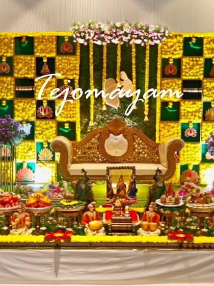 A baby shower setup with a unique backdrop of lotus and bird motifs, showing how I can work with different themes to create a special atmosphere.