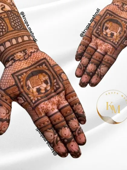 A majestic elephant motif enclosed in a decorative square, surrounded by delicate lotus flowers. This design is a perfect blend of strength and grace.