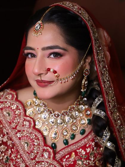 Another angle of this stunning bride. The focus is on her expressive eyes, with a subtle shimmer and a defined lash line, paired with a custom mixed lip color.