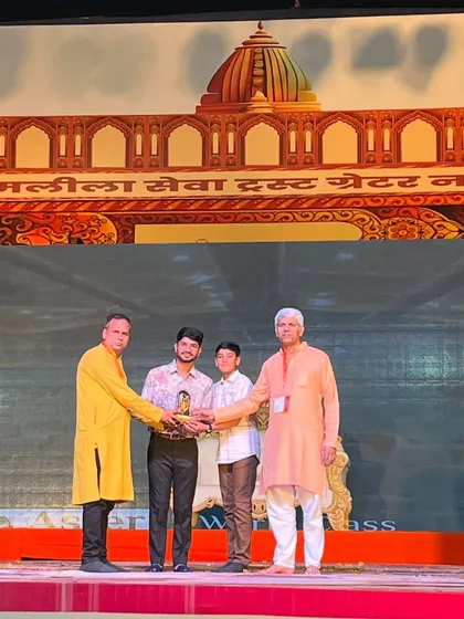A close-up of the award being presented to our team for the flawless execution of the grand Ram Lila event.