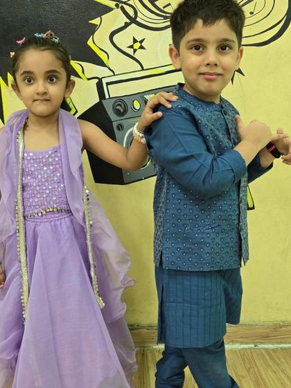 More adorable photos of our little ones celebrating Janmashtami. Each child brings their own unique charm and energy to our festive classes.