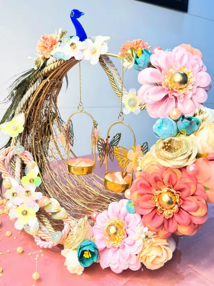 A bright and cheerful take on our peacock ring platter, featuring a vibrant mix of pink, blue, and yellow flowers. This design is perfect for a daytime engagement ceremony, bringing a pop of color and joy.