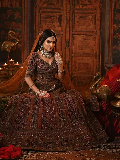 A full-length shot that captures the majestic feel of the entire look, from the outfit to the setting.