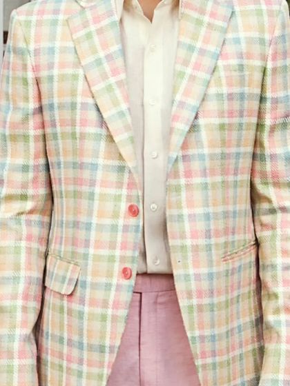 The pastel check pattern is perfect for spring and summer events, offering a fresh and modern take on formalwear.