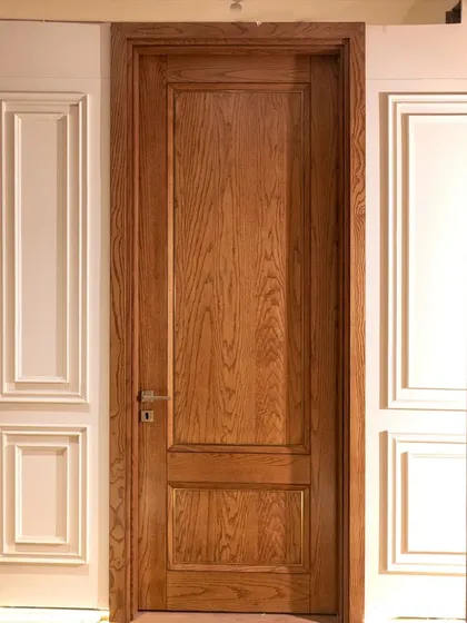 A full view of the two-panel ashwood door, set against classic wall molding. This demonstrates how my doors can work beautifully in both modern and traditional settings.