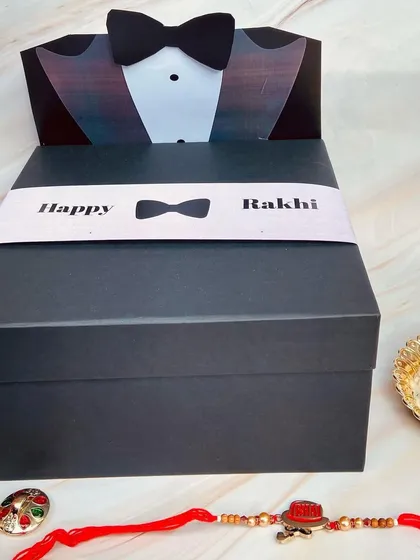 The sleek and stylish tuxedo box is a perfect way to present your Rakhi gift to your brother, making the experience special from the moment he receives it.