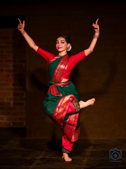 A pose that combines balance and extension, creating a beautiful line. This is from a performance at the Navarasotsava festival.