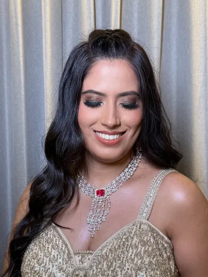 A close-up of the smokey glitter eye. This is a perfect example of a bold yet elegant evening look.