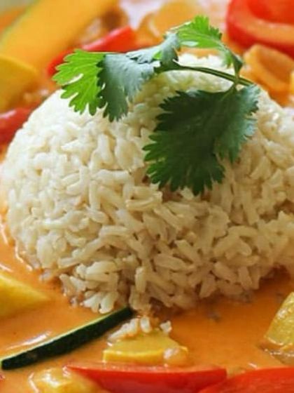 Our Thai Red Curry is a fragrant and flavorful dish, packed with fresh vegetables and served with steamed rice. It's a wonderful main course option for any event.
