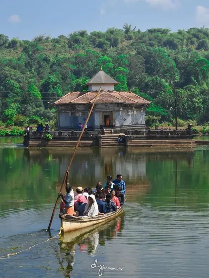 A serene boat journey towards the beautiful island temple at Varanga Kere. This is one of the hidden gems we explore on our backpacking trips across Namma Karnataka.