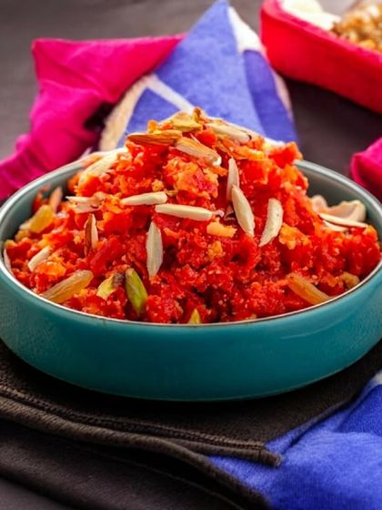 No winter festival is complete without Gajar ka Halwa. Ours is made with fresh carrots and saffron, and served in a bowl topped with nuts.